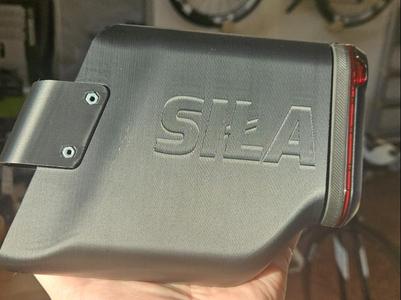 Aero bicycle tool box with Garmin Varia mount