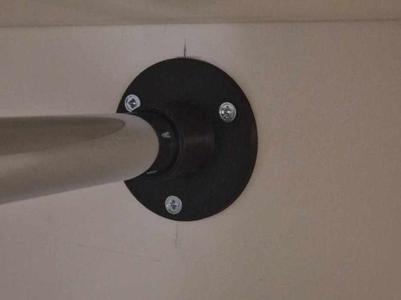 Closet rod holder