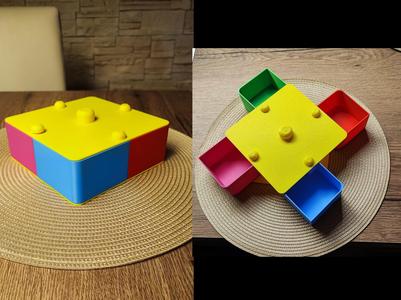 Rotating storage box with 4 containers.