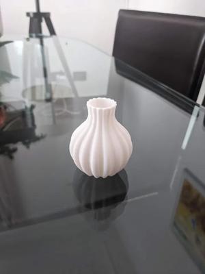 Simple small bulbous vase