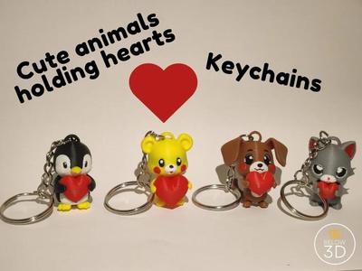 Cute animals holding hearts keychains