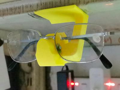Under-desk Eyeglass Holder