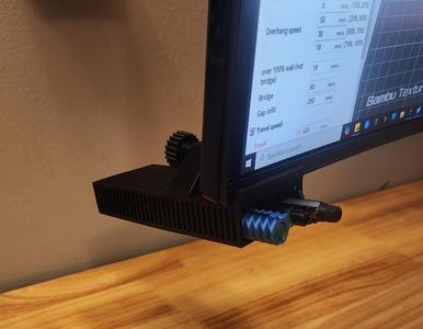 Under monitor pen and pencil holder