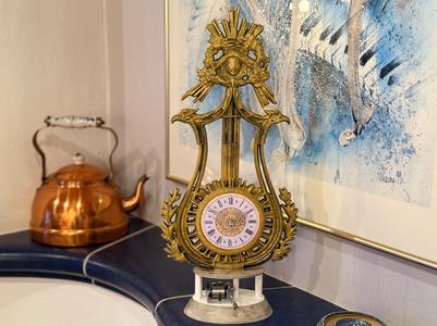 Apollo’s Lyre: Music Box And Mantle Clock