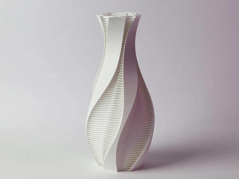 Twisted vase with strands