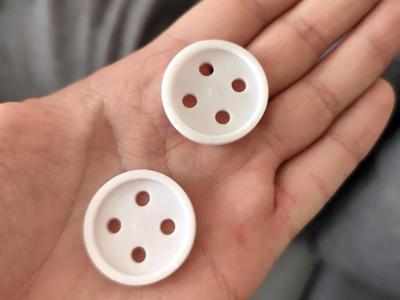 Practical clothing button measuring 30x30mm