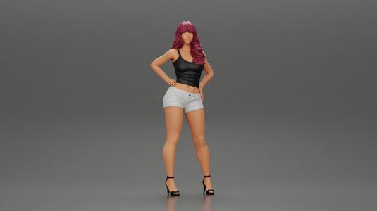 Asian girl posing in shorts next to a car
