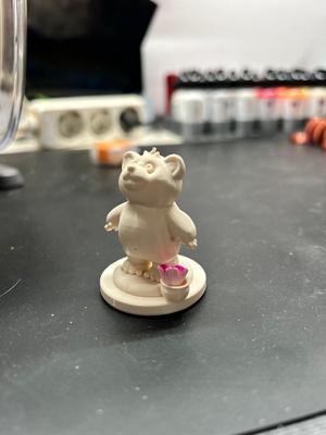 Miela the bear with a honey pot