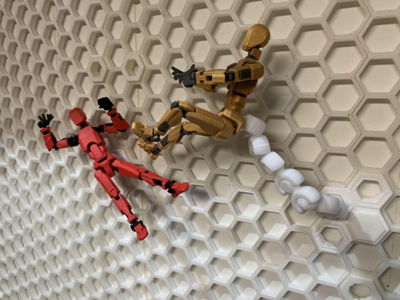 Flexible and posable display arm for Dummy 13 on the HSW (honeycomb storage wall)
