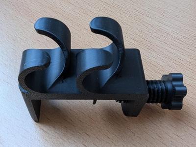 Desk cable management guide with mounting clamp