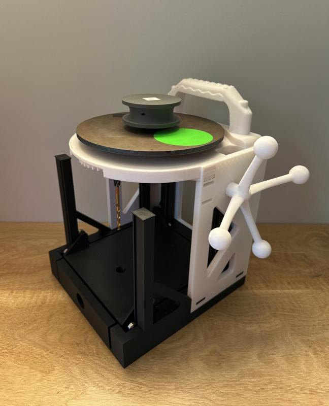 Flywheel Powered Drill Press