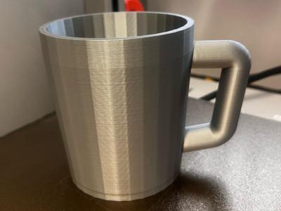 Ice cream tub holding mug