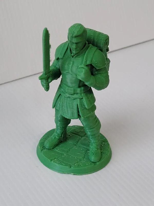 Male model adventurer on round base