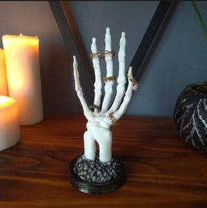 Skeleton hand jewelry stand