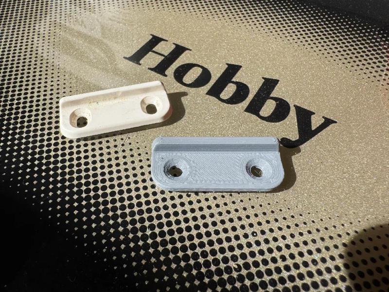 Zarážka dvířek pro karavan Hobby 540