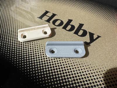 Zarážka dvířek pro karavan Hobby 540