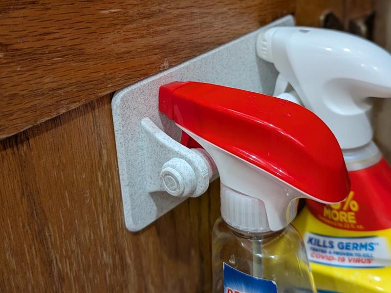 Spray bottle door hanger