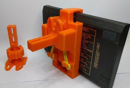 Car or wall mount gripping smartphone holder system
