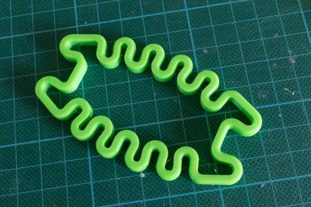 Squished Bug Earphone Holder – springy