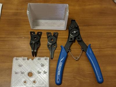 Cover and holder for ring pliers