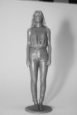 Standing figure of young woman