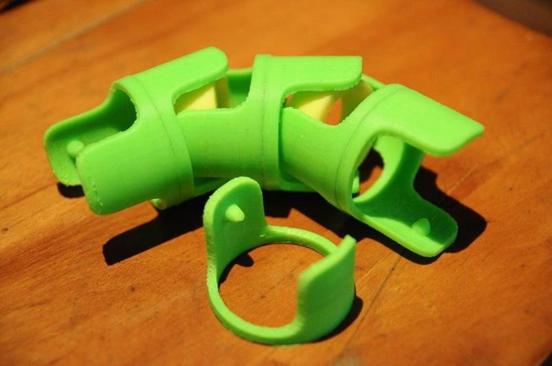 Modular hollow universal joint for cable management