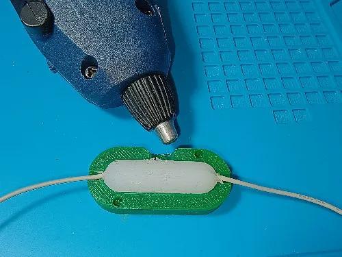 A form for injecting hot glue to hermetically seal the wire connection   
