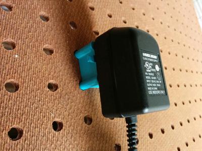 AC adapter organizer for 9/32 inch pegboard