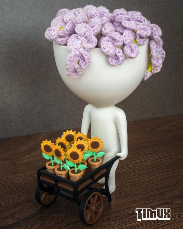 ROBERT PLANT WITH A SUNFLOWERS CART