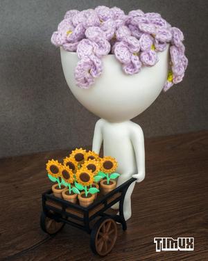 ROBERT PLANT WITH A SUNFLOWERS CART