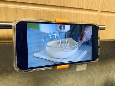 Mobile phone holder and stand