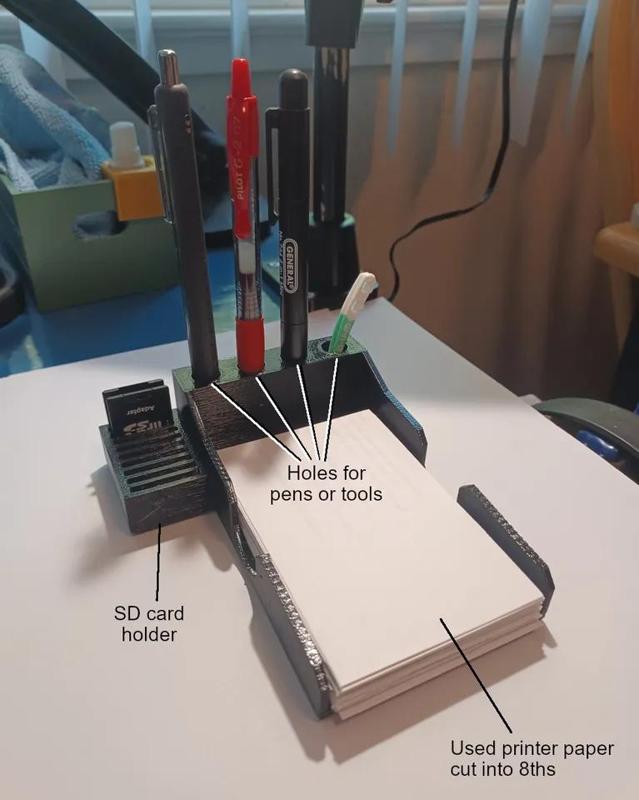 Scratch Paper, Pen, and SD Card Tray
