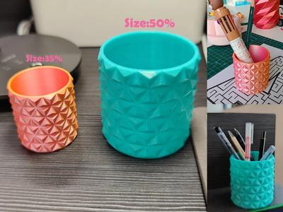 Pen holder with triangular surface