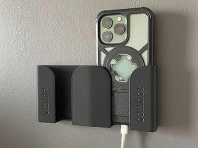 Wall mounted double phone holder