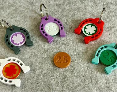 2025 – Lucky charm with shopping cart coin