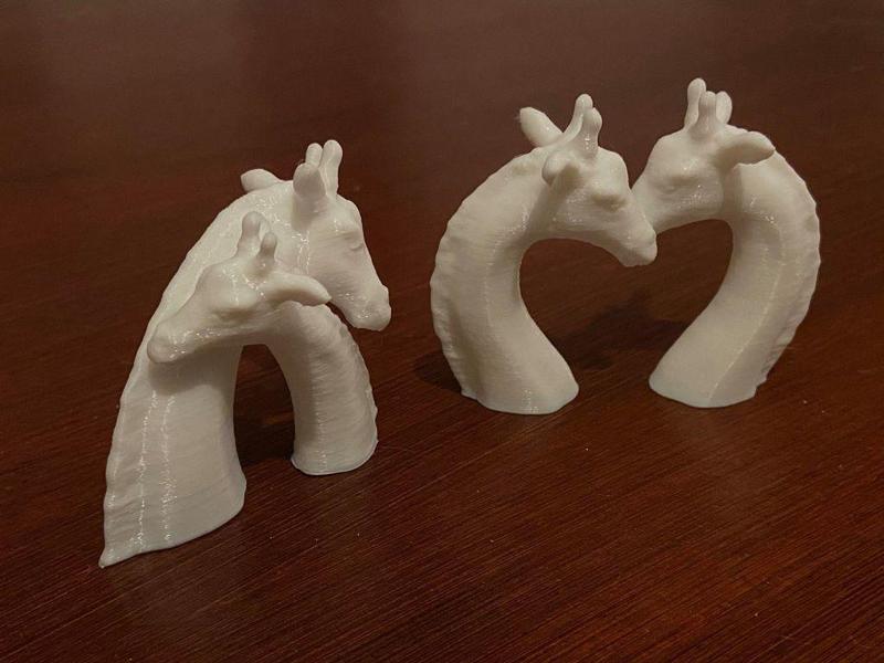 A Giraffe figurine- send a hug/kiss in COVID-19
