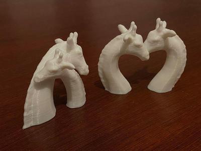 A Giraffe figurine- send a hug/kiss in COVID-19