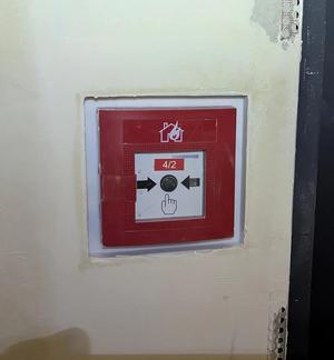 Flush-mounted frame for BMA button
