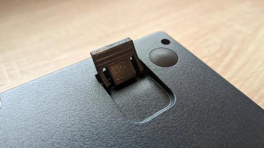 Keyboard foot / bracket leg (Corsair K57)   