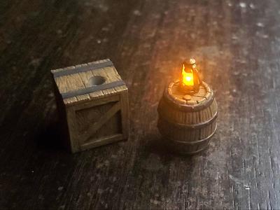Barrel and crate with flickering LED lantern