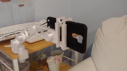 Adjustable hands free phone mount