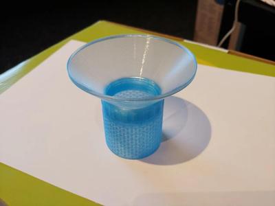 Vase mode funnel for silica gel spool container