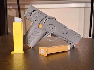 Rubber band powered PEZ launcher (Improved)