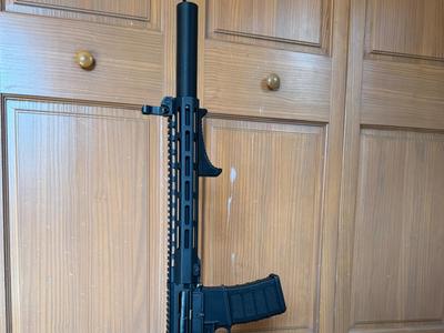 Airsoft rifle suppresser