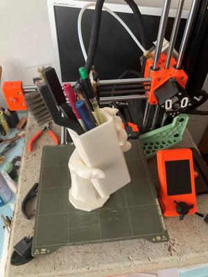Hand pen cup