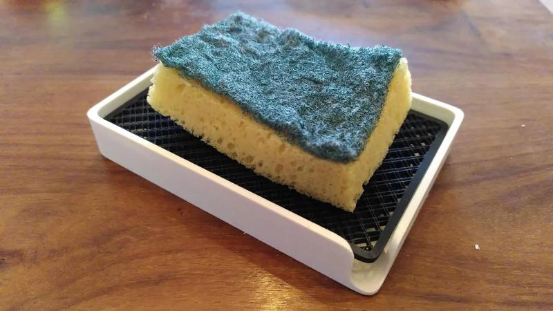 Sponge or soap holder with soap savior drawer   