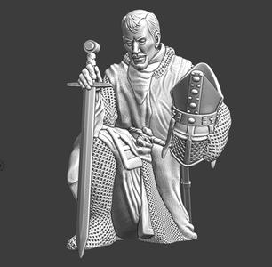 Medieval bishop kneeling and praying