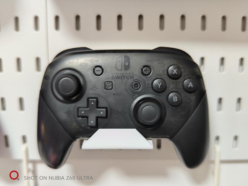 Game console controller stand