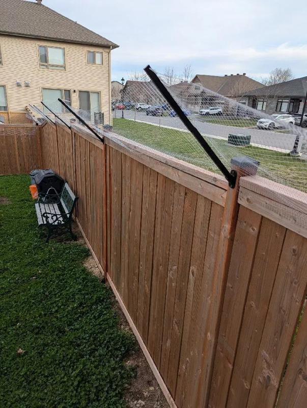 Cat containment fence extension   