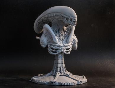 Alien bust statue